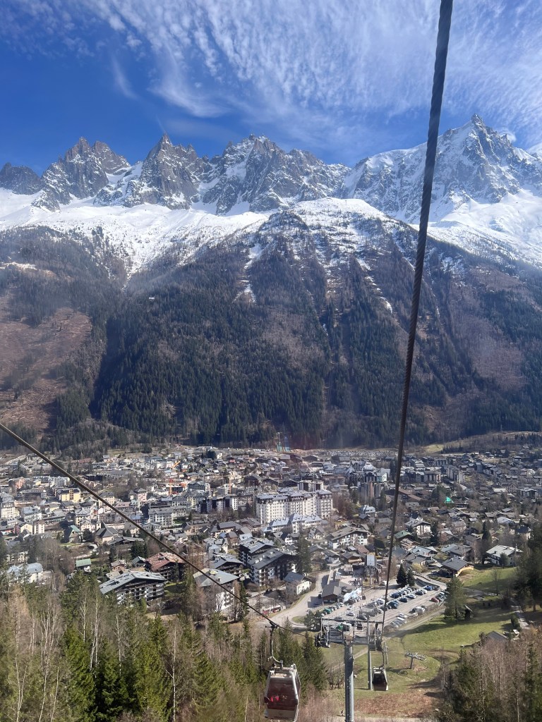 Chamonix town and the Mont Blanc massif seen from a cable car - travel photography by Sakine Gulec