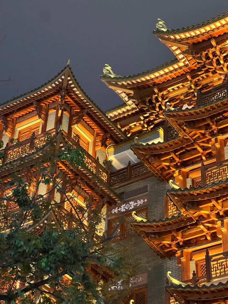 Illuminated traditional Chinese pavilion at dusk, Guangzhou - photograph by Sakine Gulec